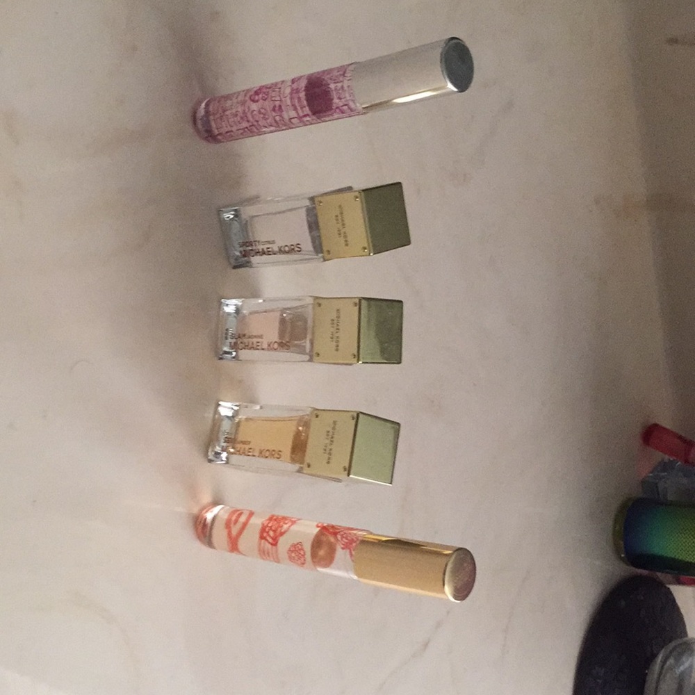 Mini Michael Kors perfumes/coach roller balls